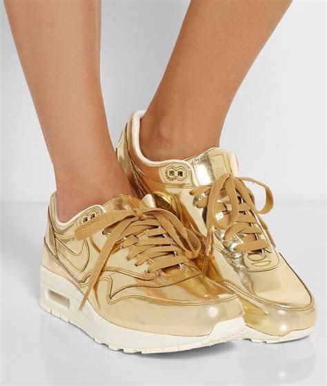 gold Nike shoes women's